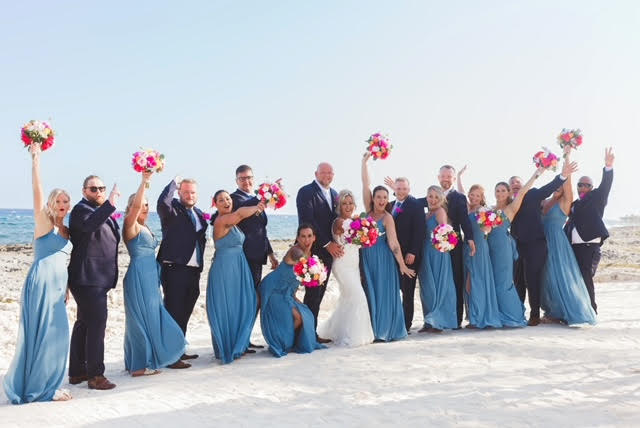 Bridesmaids and groomsmen at a beach in Mexico