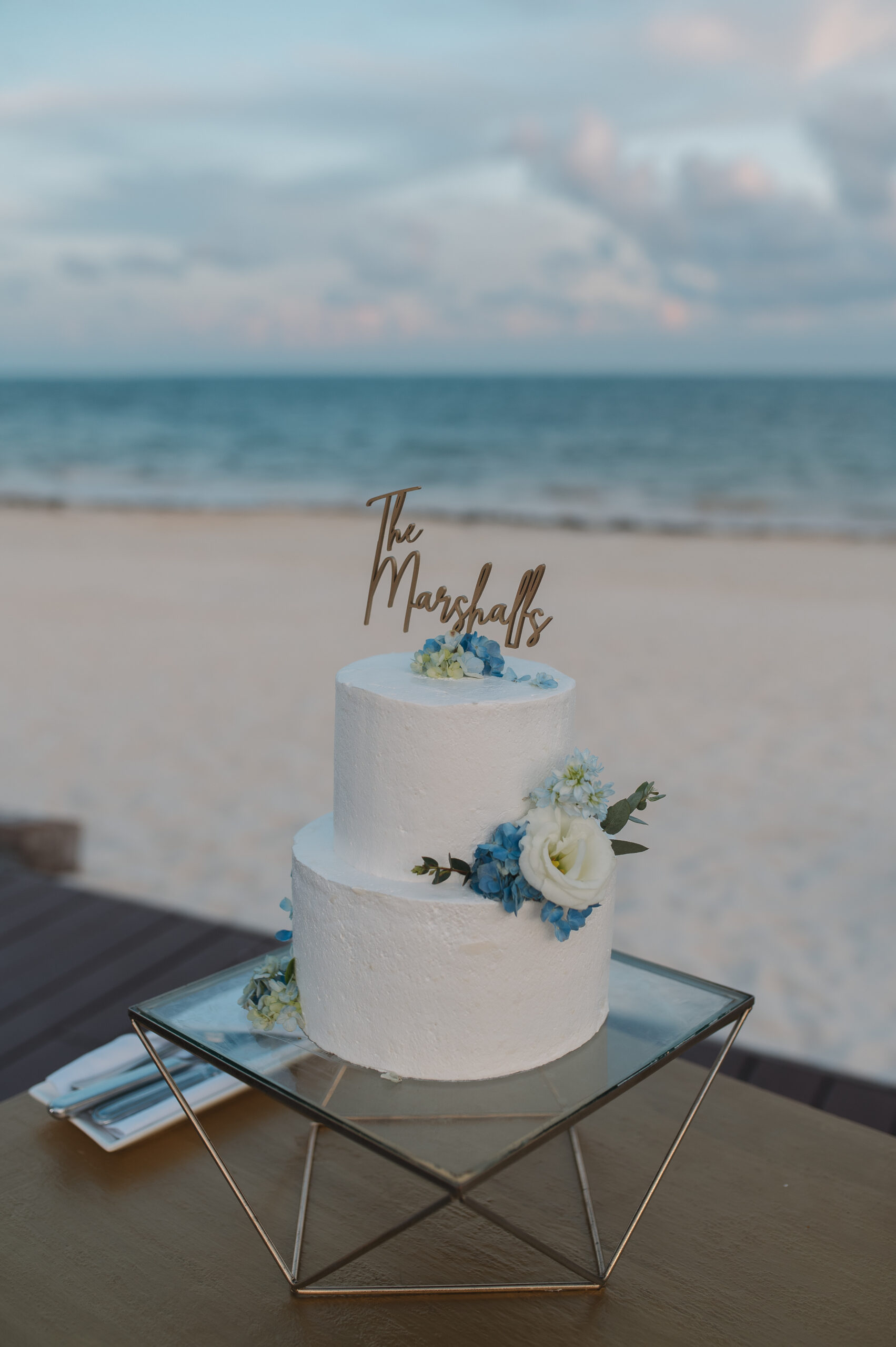 Beautiful cake on the background of the ocean at dreams riviera cancun, mexico