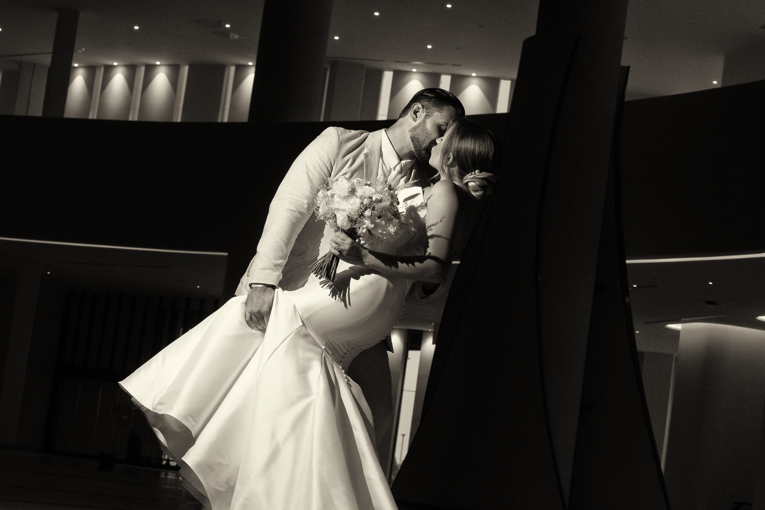 Bride and groom kissing at destination wedding