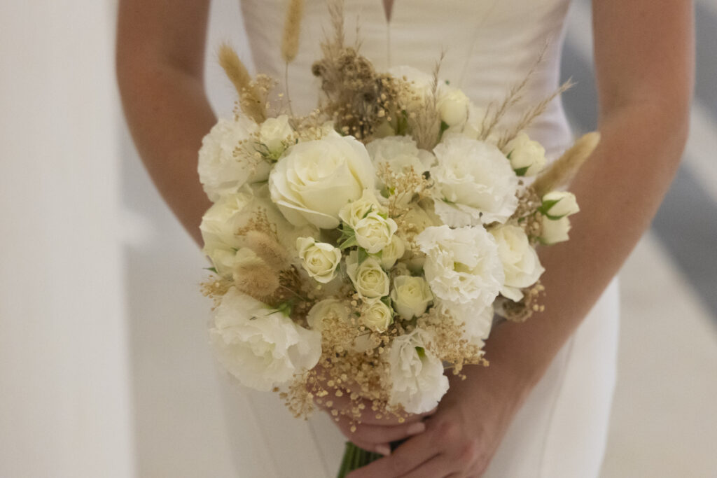 Bride holding a bouquet at destination wedding