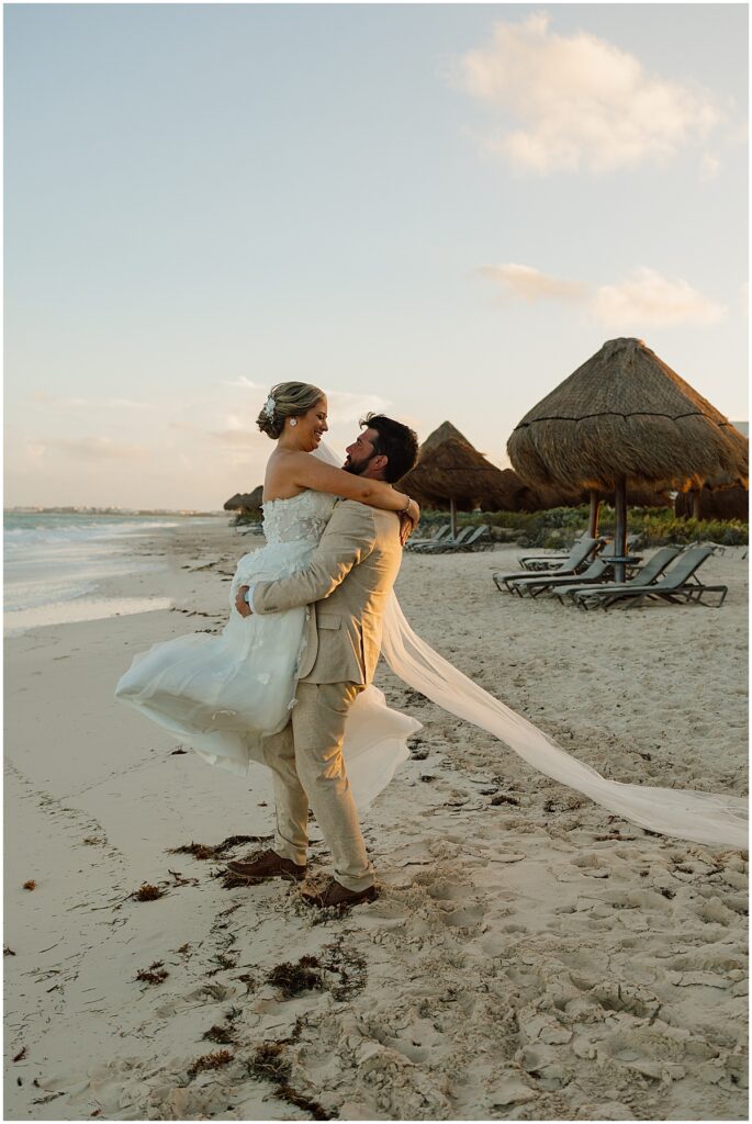 Bride and groom portraits on the beach in Cancun Mexico