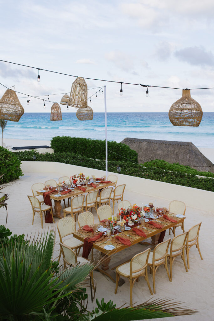 Cancun sunset over the beautiful table set up for your destination wedding
